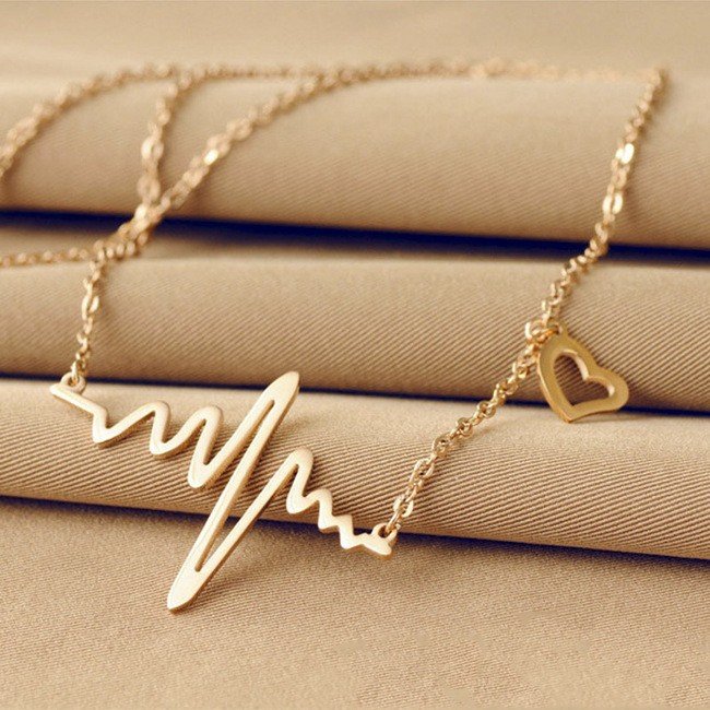 Gold colored heartbeat necklace image