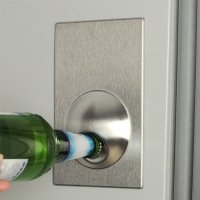 Refrigerator bottle opener magnet